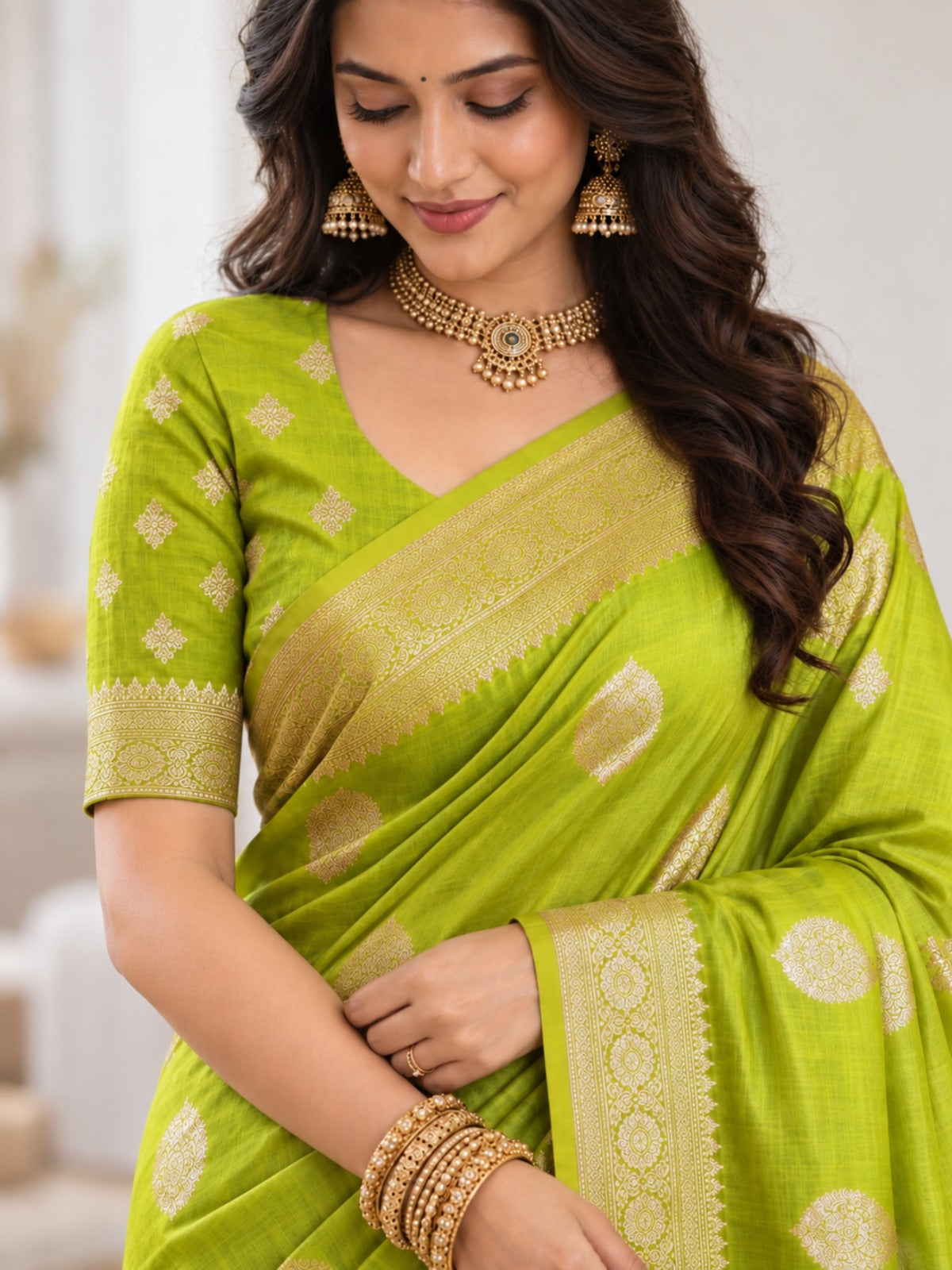 Parrot Green Silk Saree with Gold Leaf Buttis